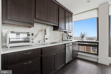 Perched high above the city in Society Hill Towers, this newly - photo 13