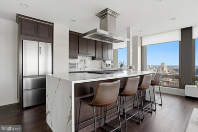 Perched high above the city in Society Hill Towers, this newly - photo 15