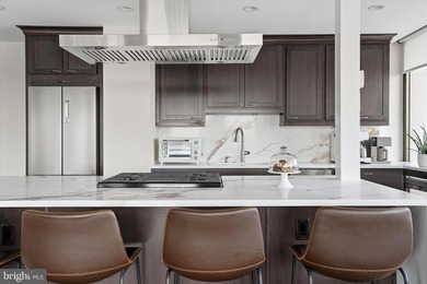 Perched high above the city in Society Hill Towers, this newly - photo 16