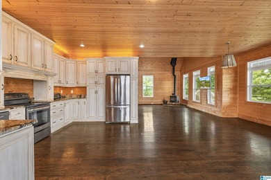 Sellers are taking a loss! This custom-built home with - photo 24