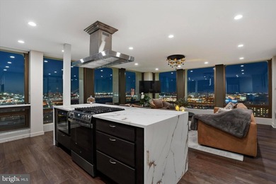 Perched high above the city in Society Hill Towers, this newly - photo 29