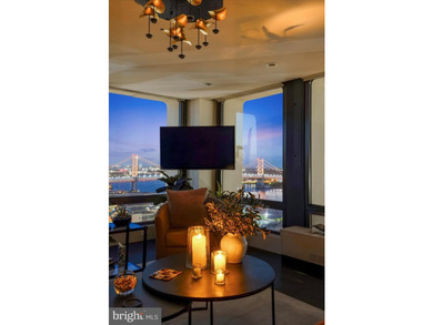 Perched high above the city in Society Hill Towers, this newly - photo 34