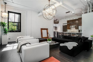 Set in the heart of Buckhead, this sleek, renovated two-bedroom