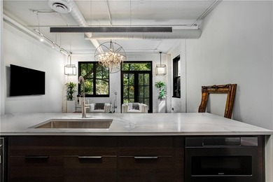 Set in the heart of Buckhead, this sleek, renovated two-bedroom