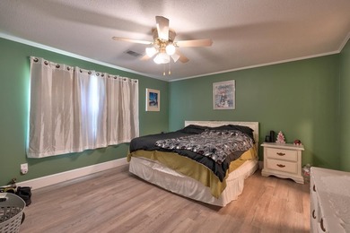 Welcome home to this beautifully updated 4-bedroom, 3-bath - photo 10