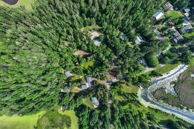 Nestled among mature pines and along a peaceful channel, the - photo 13