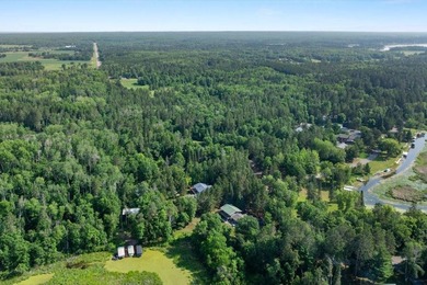 Nestled among mature pines and along a peaceful channel, the - photo 17