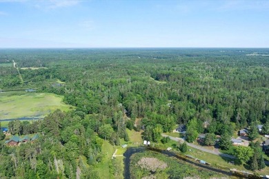 Nestled among mature pines and along a peaceful channel, the - photo 18