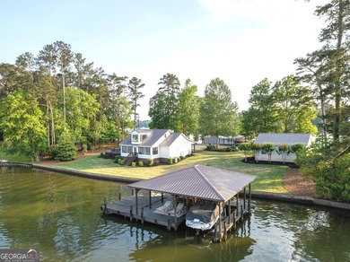 Completely reimagined and beautifully renovated, this Lake - photo 1
