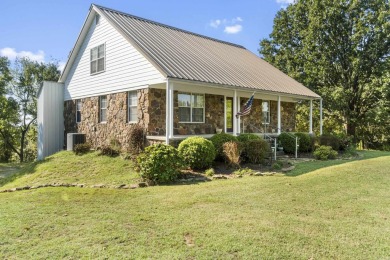 One-owner, custom-built three-story rock home featuring 3