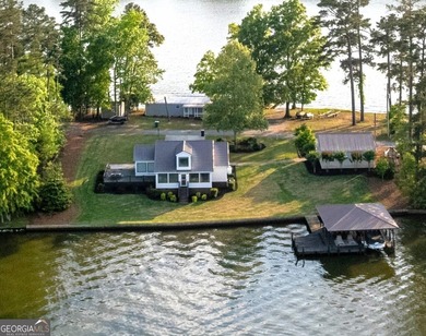 Completely reimagined and beautifully renovated, this Lake - photo 2