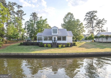 Completely reimagined and beautifully renovated, this Lake - photo 3