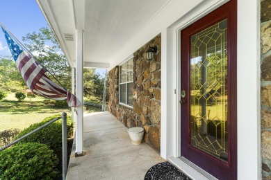 One-owner, custom-built three-story rock home featuring 3