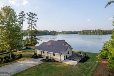 Completely reimagined and beautifully renovated, this Lake - photo 4