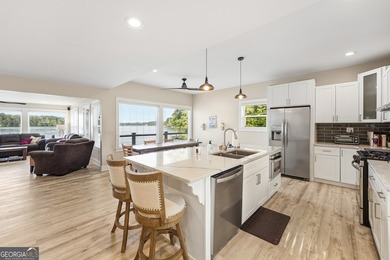 Completely reimagined and beautifully renovated, this Lake - photo 6