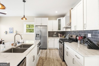 Completely reimagined and beautifully renovated, this Lake - photo 9