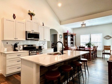 This *better than new* home combines the pristine condition of a - photo 5