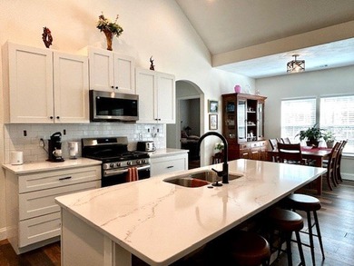 This *better than new* home combines the pristine condition of a - photo 10