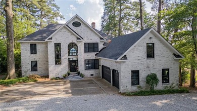 Private waterfront home on 1.25 acres offers the ultimate in - photo 1