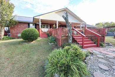 Looking for a relaxing homestead? This well-built brick home