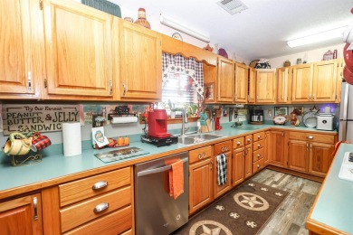 Looking for a relaxing homestead? This well-built brick home