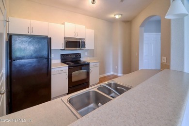 A refreshed, move-in-ready 3-bedroom, 3-bath condo with major - photo 4
