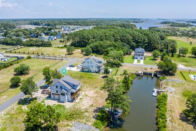 Welcome to 405 Salt Grass Lane, a stunning waterfront retreat in - photo 11