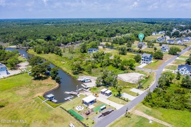 Welcome to 405 Salt Grass Lane, a stunning waterfront retreat in - photo 12