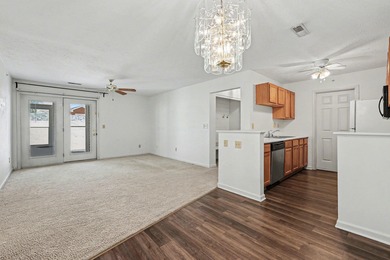 Why pay rent when you can own? This first-floor, no-step living