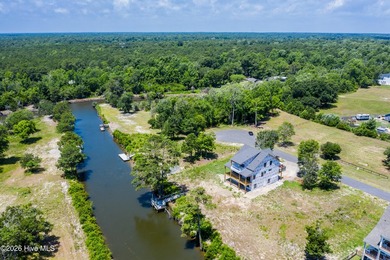 Welcome to 405 Salt Grass Lane, a stunning waterfront retreat in - photo 14