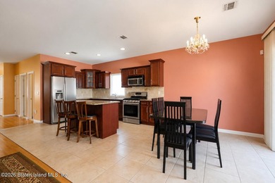 This gorgeous 2-family, 4-bedroom, 3-bathroom, side-hall - photo 16