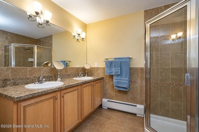 This gorgeous 2-family, 4-bedroom, 3-bathroom, side-hall - photo 25