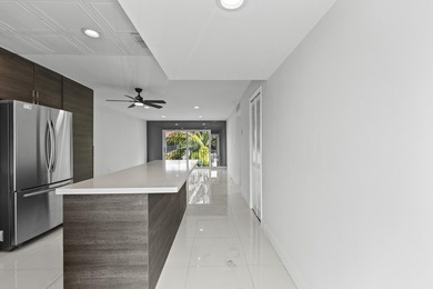 Rarely available! This stunning 2-bedroom, 2-bath corner unit in - photo 2