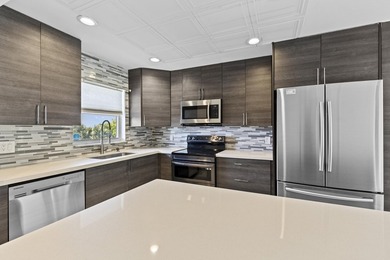 Rarely available! This stunning 2-bedroom, 2-bath corner unit in - photo 3