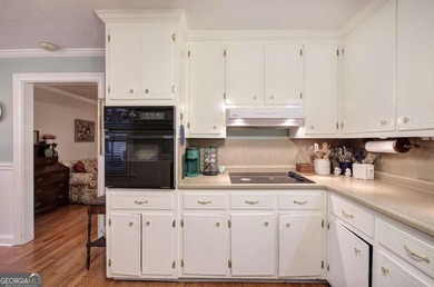 Charming 4-Sided Brick Ranch in the City with Original Hardwood