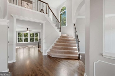 This stunning 6-bedroom, 5-bathroom riverfront home offers the - photo 5