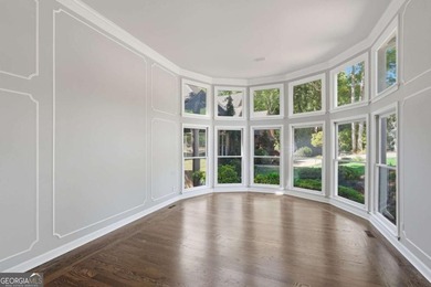 This stunning 6-bedroom, 5-bathroom riverfront home offers the - photo 6