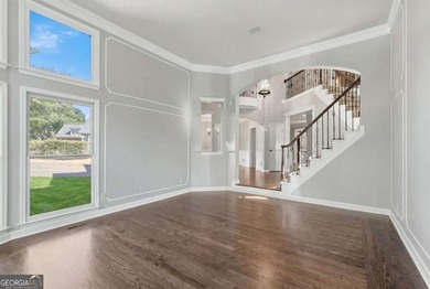 This stunning 6-bedroom, 5-bathroom riverfront home offers the - photo 8
