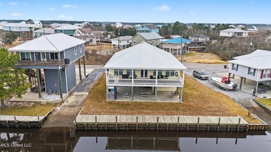 Welcome to refined coastal living in this custom-built - photo 2