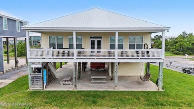 Welcome to refined coastal living in this custom-built - photo 4
