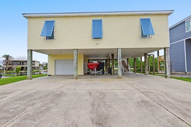 Welcome to refined coastal living in this custom-built - photo 5