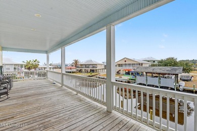 Welcome to refined coastal living in this custom-built - photo 6