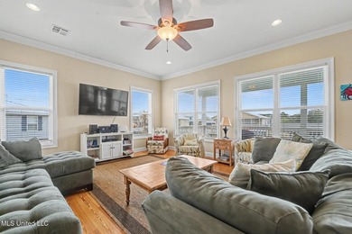Welcome to refined coastal living in this custom-built - photo 7