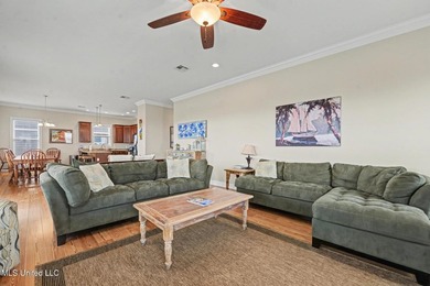 Welcome to refined coastal living in this custom-built - photo 9