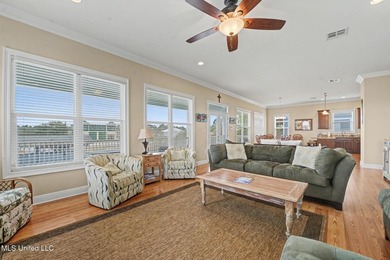 Welcome to refined coastal living in this custom-built - photo 10