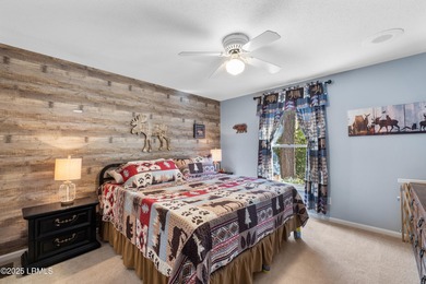 This well-designed ranch home offers 3 bedrooms, 2.5 baths, and