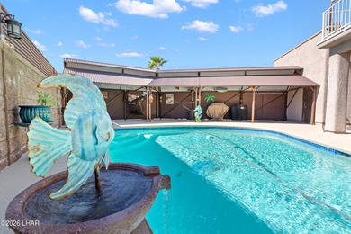 Beautiful desert lake home offering 3 bedrooms, 2 baths, and a - photo 3