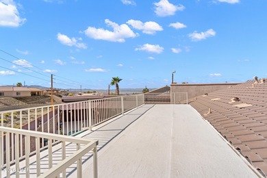 Beautiful desert lake home offering 3 bedrooms, 2 baths, and a - photo 4