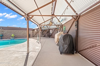 Beautiful desert lake home offering 3 bedrooms, 2 baths, and a - photo 5