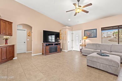 Beautiful desert lake home offering 3 bedrooms, 2 baths, and a - photo 9